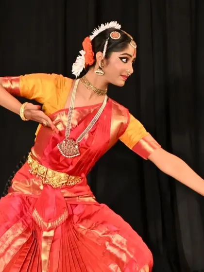 The aramandi, or half-seated posture, is foundational to Bharatanatyam. Here, my student demonstrates the perfect form and balance required, a result of countless hours of training for her arangetram.