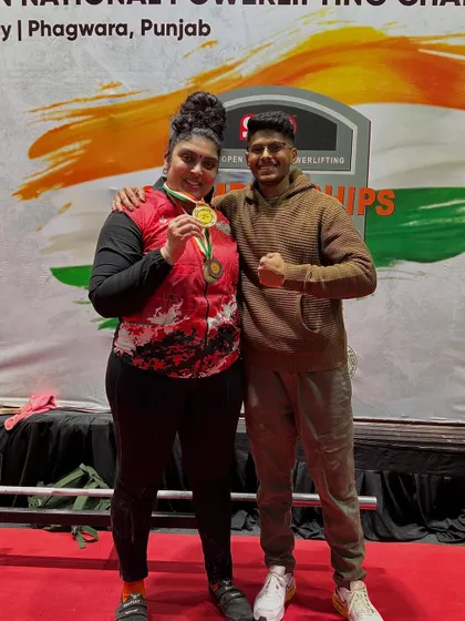 This is more than a medal; it's the result of a partnership built on trust and hard work. Standing with my athlete Pooja after she was crowned National Champion, breaking the deadlift record in the process. My role as a coach goes beyond just programming; it's about navigating challenges like her endometriosis together to achieve greatness.