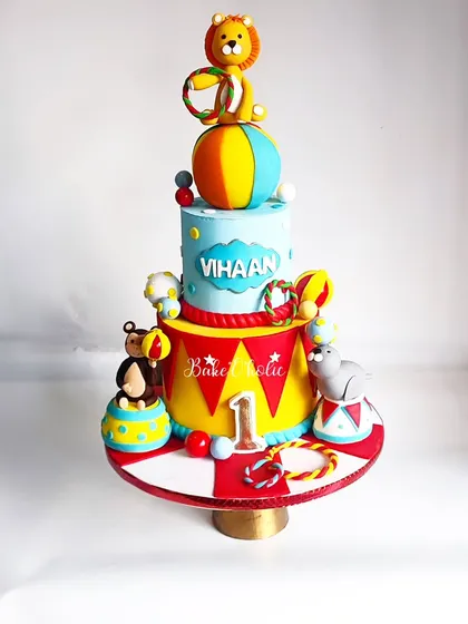 The circus is in town with this incredible carnival-themed cake for Vihaan's 1st birthday. This detailed 3kg Chocolate truffle cake features a lion, monkey, and seal performing stunts.
