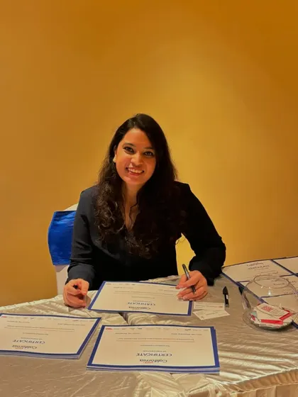 Here I am at my station during the 'Visit California' event. This kind of work is my creative downtime, allowing me to focus on the simple beauty of forming each letter perfectly.