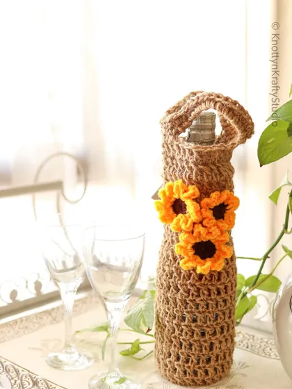 A summer soiree calls for a chilled bottle of wine, dressed up in my jute and sunflower wine cozy.