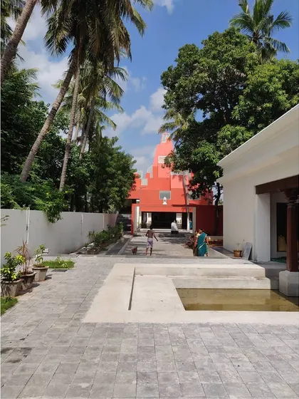The processional path at the Sai Temple, with a water channel leading towards the main structure. Water is used as a key element to sensitize the senses and mark the ritual journey.