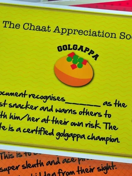 A fun "Chaat Appreciation Society" certificate designed as a party favor. It's a quirky and humorous way to remember the delicious food at the event.