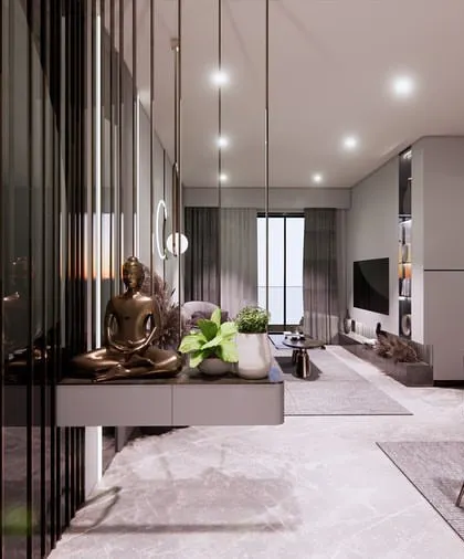 A key tip for budget-friendly luxury is to invest in good styling. Here, a simple layout is elevated by carefully chosen upholstery, soft furnishings, and a serene Buddha statue.