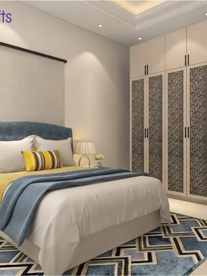 A bright and airy bedroom from our 'Heritage County' project, with a blue and yellow color scheme and a patterned wardrobe.