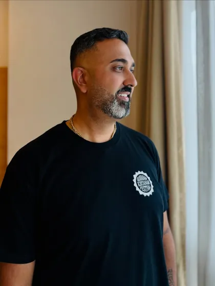 For musician Radhika Dasa, we went with a classic, clean haircut and a perfectly groomed salt-and-pepper beard. A timeless and sophisticated look.