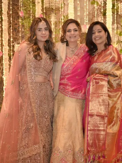 A group photo spreading the sparkle with beautifully made-up guests.