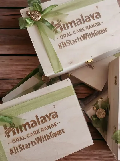 A stack of our custom-branded wooden boxes, ready for dispatch. We ensure every single hamper, whether it's one or a thousand, meets our high standards of quality and presentation.