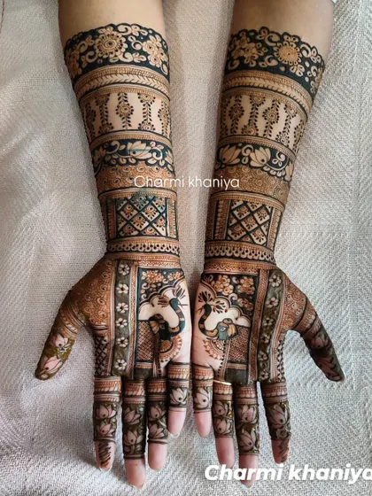 A lovely design for the wedding party, featuring cute elephants and lotus flowers. It’s detailed but not as heavy as a full bridal look.