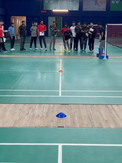 An empty court set up with markers and cones before a coaching session begins. This is the canvas where I teach coaches how to structure effective and engaging training drills.