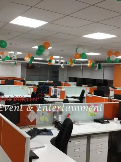 Another view of a corporate office decorated with tricolor balloon clusters. We ensure the decorations are placed strategically to cover the entire workspace and create a cohesive look.