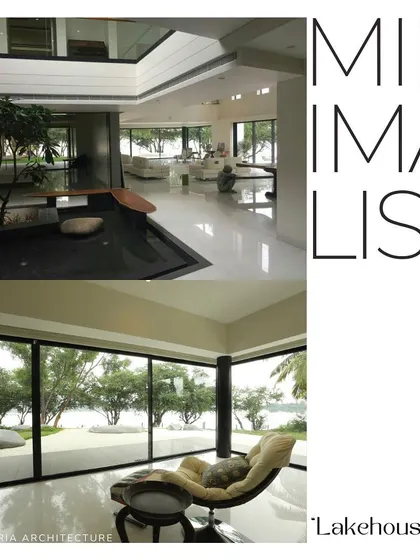 This minimalist interior from our "Waterfront Home" project features an indoor water court. The design uses a simple palette of white floors and dark water to create a serene, contemplative atmosphere.