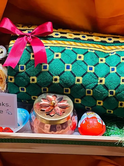 This version of the thank you hamper includes Kinder Joy eggs, making it a fun gift for someone with a sweet tooth.