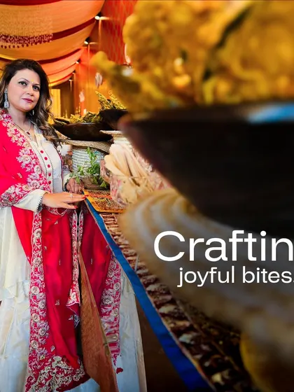 Our co-founder and food stylist, Sakshi Tuli, standing by one of our elaborate setups, crafting joyful bites that make every celebration unforgettable.