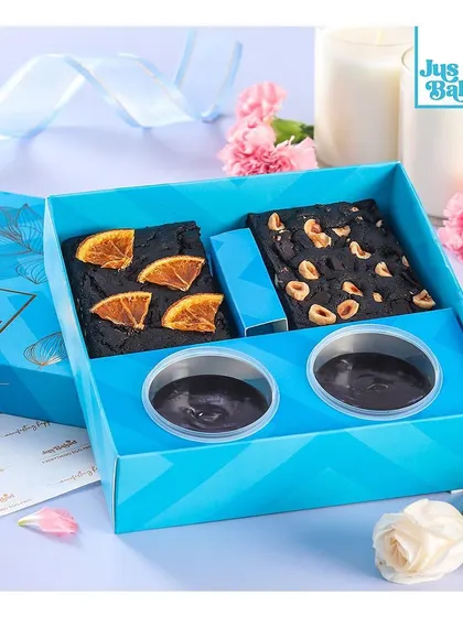 Our 'Guilt-Free Happiness Box' for Rakhi, featuring healthier brownie options like orange and hazelnut, along with chocolate dips.