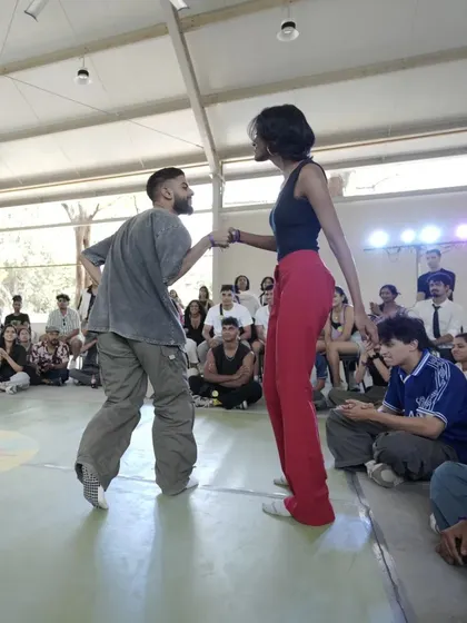 A moment from the battles at Spectra, where dancers connect and compete.
