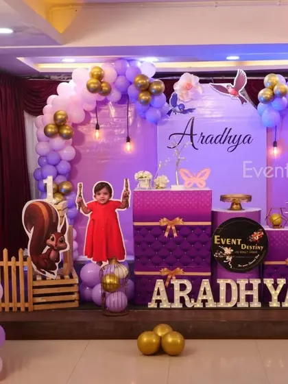 The full view of the Sofia the First birthday stage. We include fun details like a photo booth frame and character cutouts of Sofia's animal friends.