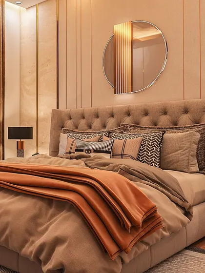 For my client Trisha, who wanted a luxurious bedroom, I designed this sanctuary with a soothing palette of white and orange. The plush, tufted headboard and metallic accents whisper 'royal relaxation'.