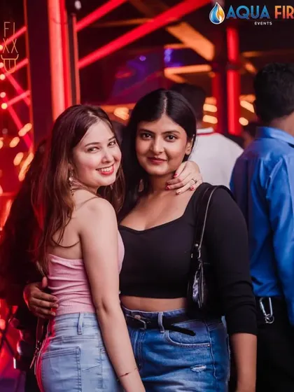 Two friends posing for a picture, capturing the fun of a weekend in Bangalore.