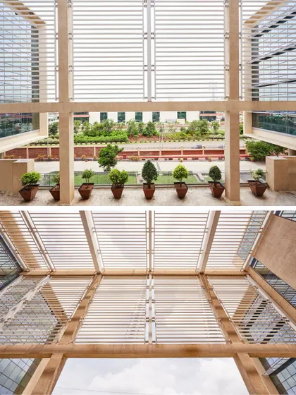 The facade of the Mahindra Chakan office features an extensive system of louvres that provide shade and control daylight. This climate-responsive strategy reduces energy consumption while creating a comfortable indoor environment.