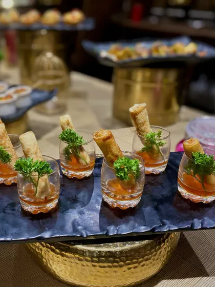 A closer look at my spring roll shooters. The individual glass presentation prevents mess and makes it easy for guests to enjoy while mingling at a corporate function.