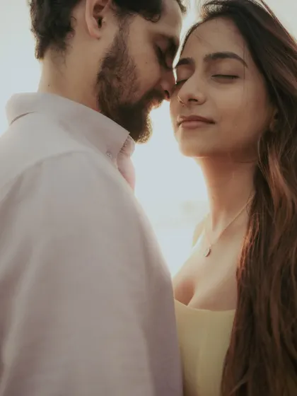 A close-up of a tender moment, with eyes closed in contentment. These are the 'in-between' shots that hold so much emotion.