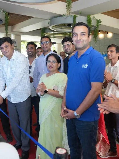 Our founder cutting the ribbon at the inauguration of the 400kW solar project at Infinity Cooperative Housing Society in Pune.