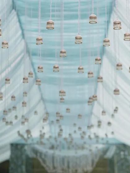 A detail shot of the hanging bells from the Anand Karaj ceremony ceiling. This subtle, traditional element added a delicate and meaningful touch to the overall design.