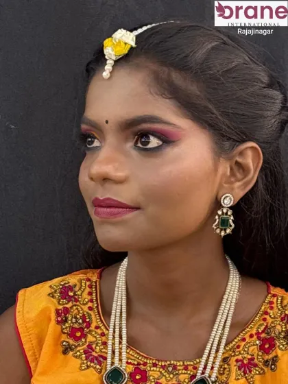 A beautiful profile shot showcasing the complete Haldi look with floral jewelry.