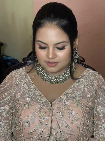 A close-up on the finished makeup. The soft brown smokey eye and nude pink lip is a classic combination that you will learn to perfect for a variety of clients and occasions.