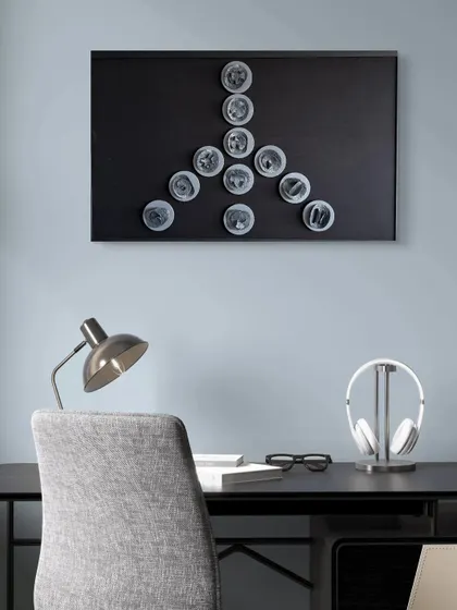 The 'Peace' symbol from the Cutting Edge series shown in a study. It's a perfect visual reminder to bring calm and focus to a workspace.