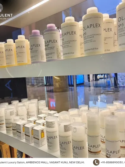 I am a huge believer in the power of Olaplex. I use it in my color services to protect the hair bonds and also offer the full take-home range to maintain your hair's integrity.