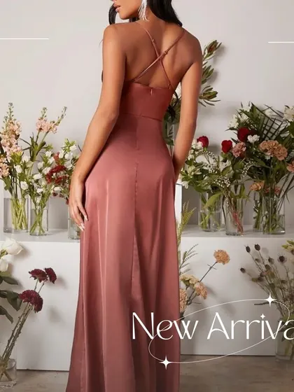 The back of the Mauve Satin Dress features a simple criss-cross strap design. It’s an elegant detail that complements the dress's clean lines and flowing silhouette.