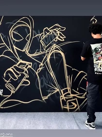 The first step of any live piece: the sketch. Here I am laying down the initial gold lines for my Spider-Man mural at Comic-Con.