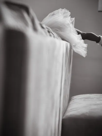 I often focus on the small details that tell a larger story. This artistic, black and white shot highlights the texture of a tutu, adding a touch of visual poetry to a candid kids photoshoot.