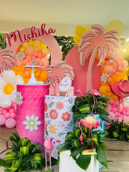 A vibrant flamingo-themed pool party, perfect for a summer celebration. We used bright pinks and oranges, with tropical leaf accents.