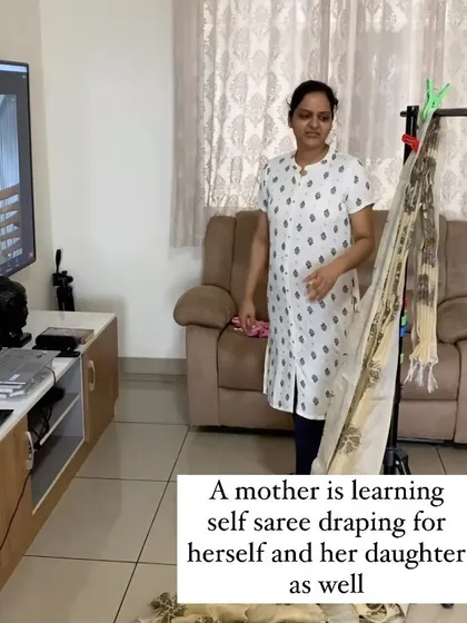 A mother learning self saree draping online for herself and her daughter. This is a skill she can pass on, which is a beautiful thing.