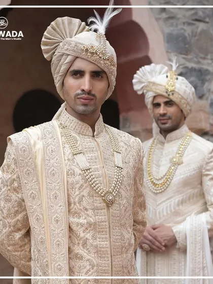 Two grooms from the Shauhar collection, showcasing different styles of embroidery and safas. This highlights the personalized approach I take to creating royal wedding wear.