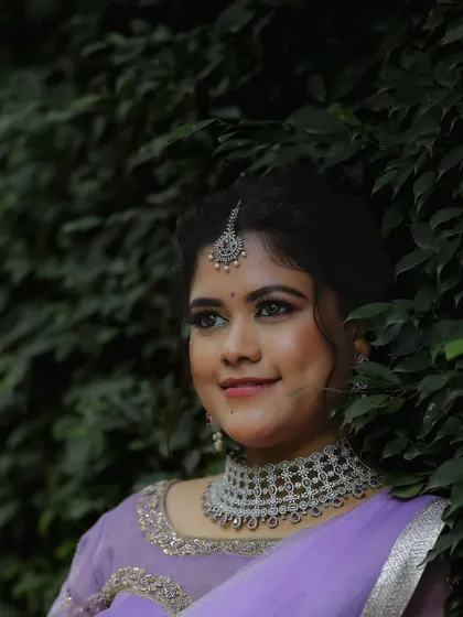 A close-up portrait highlighting the intricate design of our web-style American Diamond choker. It's a modern yet elegant choice for any special occasion.