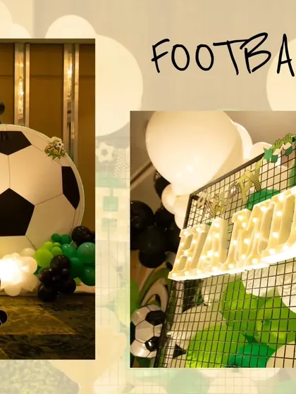 A detail shot of the football party decor, including a giant inflatable football and a light-up marquee name sign.