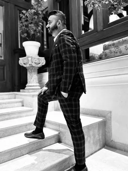 A black and white shot capturing a classic, timeless look for a wedding event.