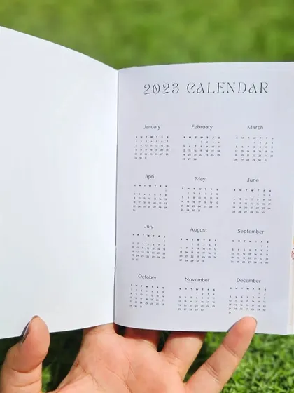 The planner also includes a full 2023 calendar at a glance, making it easy to plan ahead.