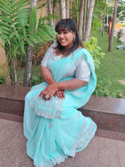 A full-length shot of my first saree look. It was a wonderful experience, from the draping by my mom to the final pictures.