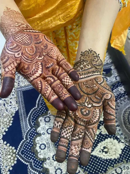 This image shows the stain from two different designs, one on each hand. Both have developed into a lovely dark color.