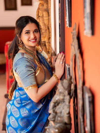 The rich blue and gold of this saree are truly timeless. I felt so connected to my craft and heritage while wearing it.