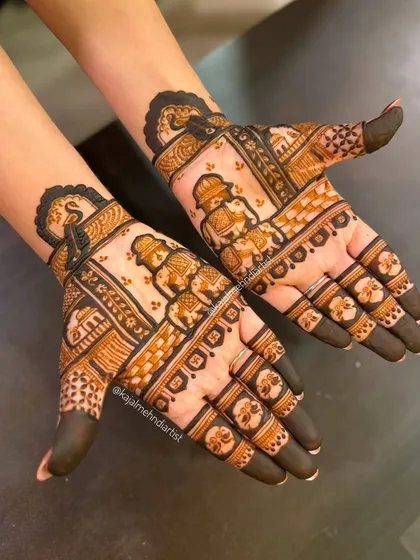Both hands together, showing the full, symmetrical design with initials and elephants. A perfect non-bridal or guest design.