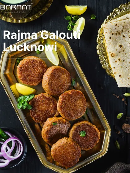 Our Rajma Galouti kebabs are smooth, spiced, and perfect for any celebration, served on a traditional platter with lemon and mint.