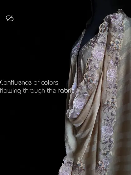 Dive into the mesmerizing world of confluence hues, where my intricate floral embroidery weaves captivating beauty into fabric art.