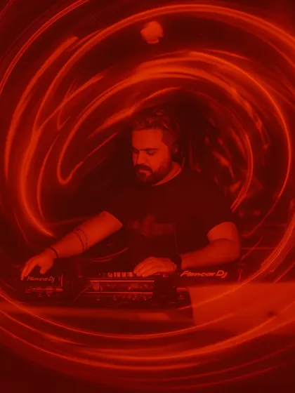 Lost in the music, riding the energy all night. This creative shot captures the feeling of being in the zone.