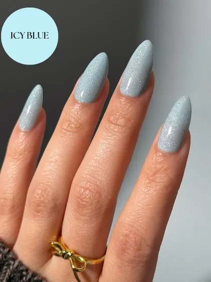 Icy Blue is a stunning shade with a subtle glitter finish. It's perfect for adding a cool, sparkling touch to your nails.